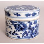 A 19TH CENTURY CHINESE BLUE & WHITE CYLINDRICAL PORCELAIN DRAGON BOX & COVER, of circular section,