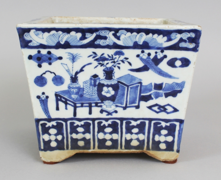 A 19TH CENTURY CHINESE SQUARE SECTION BLUE & WHITE PORCELAIN JARDINIERE, the flaring sides painted