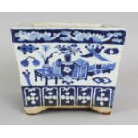 A 19TH CENTURY CHINESE SQUARE SECTION BLUE & WHITE PORCELAIN JARDINIERE, the flaring sides painted