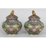 A PAIR OF GOOD QUALITY 20TH CENTURY CHINESE CLOISONNE VASES & COVERS, each decorated with formal