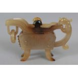 A SMALL CHINESE AGATE EWER, of archaic form and with loose ring and chilong handles, 3.8in long &