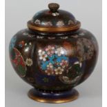 A SIGNED JAPANESE MEIJI PERIOD CLOISONNE VASE & COVER, the lobed sides decorated with floral
