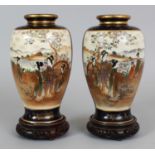 A SIGNED MIRROR PAIR OF EARLY 20TH CENTURY JAPANESE SATSUMA EARTHENWARE VASES, together with