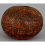 AN UNUSUAL 19TH CENTURY ENGRAVED PERSIAN GOURD, decorated in black engraving with elaborate detailed