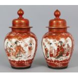 A PAIR OF JAPANESE KUTANI PORCELAIN VASES & COVERS, circa 1900, each painted with phoenix surmounted