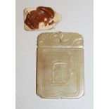 A 19TH/20TH CENTURY CHINESE RECTANGULAR JADE PENDANT, with attached export seal, 2.2in x 1.5in.