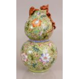 A GOOD QUALITY CHINESE LIME GREEN GROUND FAMILLE ROSE DOUBLE GOURD PORCELAIN VASE, the sides