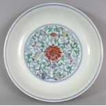 A GOOD QUALITY CHINESE DOUCAI PORCELAIN SAUCER DISH, with genuine age wear, possibly Qianlong