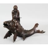 A JAPANESE BRONZE CENSER & COVER, modelled in the form of a deity reading a scroll and riding on the