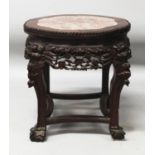 A SIMILAR 19TH CENTURY CHINESE MARBLE TOP HARDWOOD STAND, with a pierced plum blossom frieze, 17.4in