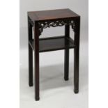 A 19TH CENTURY CHINESE CARVED HARDWOOD RECTANGULAR STAND, with undertier, the frieze pierced and