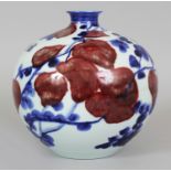 A 20TH CENTURY CHINESE PORCELAIN ART VASE, decorated with cursive calligraphy and hanging fruit, 8.