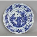 A GOOD JAPANESE EARLY ARITA BLUE & WHITE PORCELAIN DISH, circa 1700, its centre painted with two