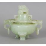 A 20TH CENTURY CHINESE CELADON GREEN CARVED BOWENITE TRIPOD CENSER & COVER, with loose ring handles,