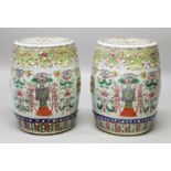 A GOOD PAIR OF 19TH CENTURY CHINESE FAMILLE ROSE PORCELAIN GARDEN SEATS, each unusually painted with