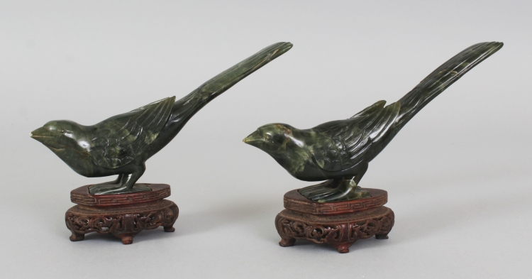 A PAIR OF EARLY 20TH CENTURY CHINESE SPINACH GREEN JADE MODELS OF GOLDEN PHEASANTS, together with
