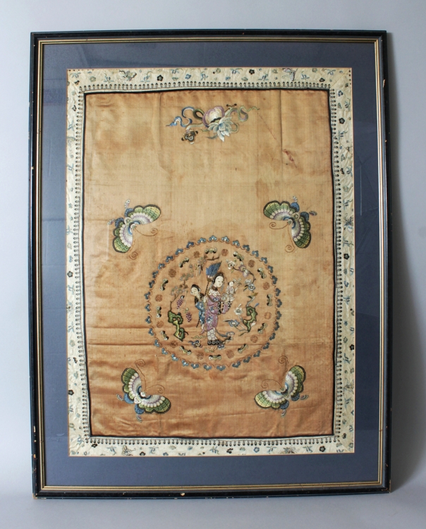 A 19TH CENTURY FRAMED CHINESE ORANGE GROUND EMBROIDERED SILK PANEL, decorated with butterflies