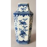 A CHINESE MING STYLE BLUE & WHITE PORCELAIN VASE, of high-shouldered chamfered square section, the