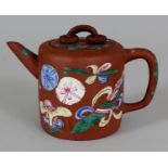 A 19TH/20TH CENTURY CHINESE YIXING ENAMELLED POTTERY TEAPOT & COVER, the sides decorated with