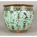A FINE QUALITY LARGE 19TH CENTURY TURQUOISE GROUND CHINESE FAMILLE VERTE MOULDED PORCELAIN FISH BOWL