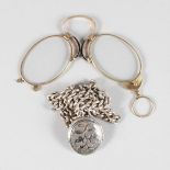 A VICTORIAN SILVER LOCKET on a silver chain and a PAIR OF LORGNETTES (2).