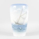 A LARGE COPENHAGEN VASE painted with a fishing boat off the coast, No. 1930 750. 12ins high.