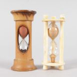 A SMALL TREEN EGG TIMER and ANOTHER IN BONE.