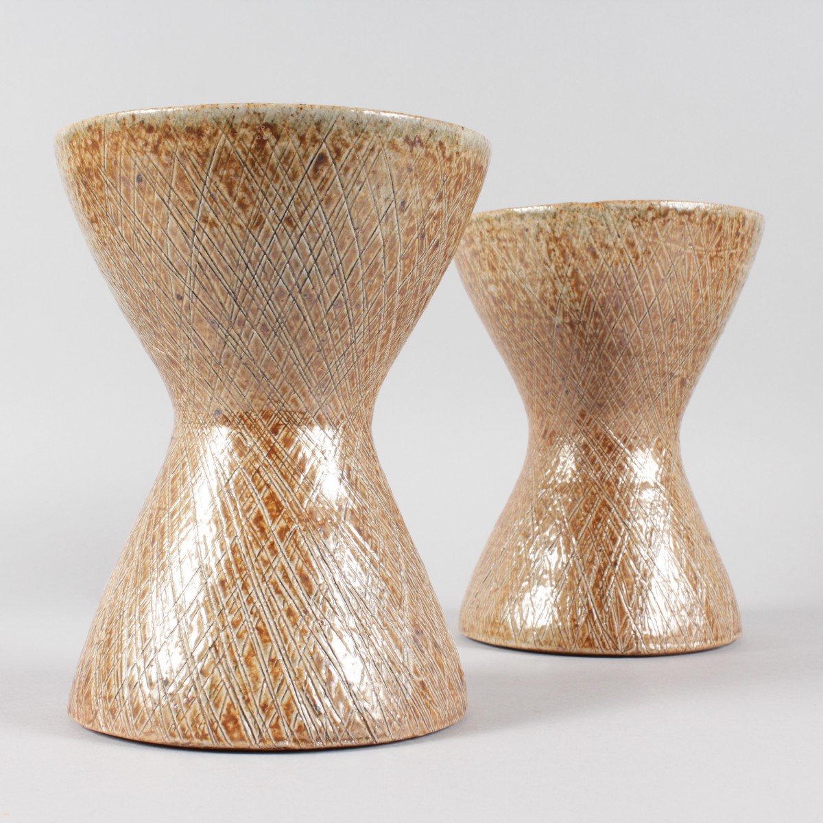 SARAH WATTS. A PAIR OF STONEWARE VASES. Impressed SW. 8ins high.