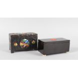 A BLACK LACQUER BOX with coral motif and a wooden box with enamel plaques (2).