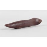 A CARVED WOODEN EEL. 17.5cms long.