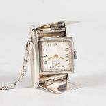 A SILVER TRAVELLING FOLDING WATCH.