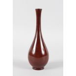 A SMALL SANG DE BOEUF BOTTLE VASE, POSSIBLY FINNISH. 8.5ins high.