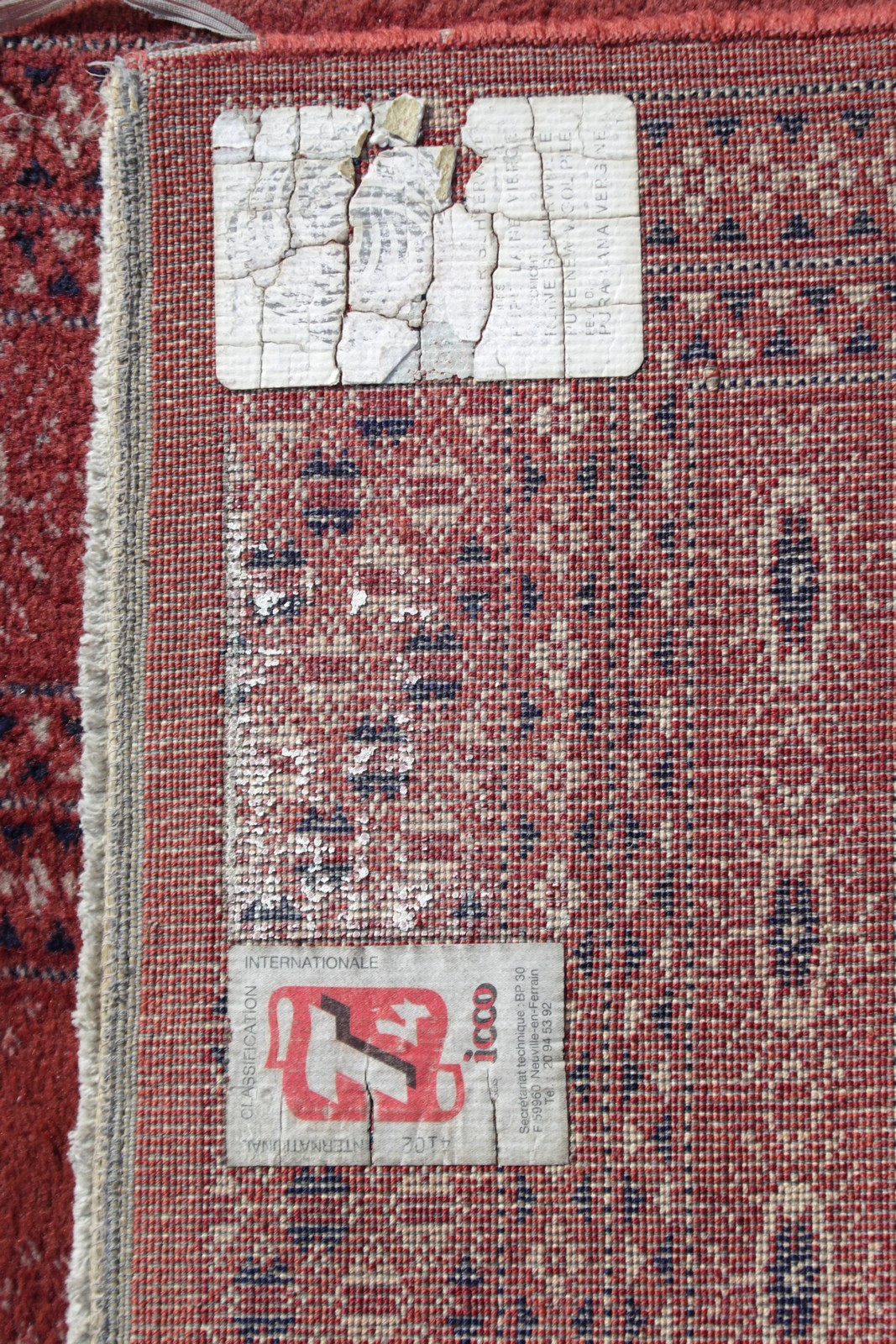 A PERSIAN WOOL CARPET, red ground, double border with central repeat pattern. 6ft x 4ft 3ins. - Image 4 of 4