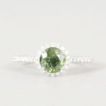 A GREEN SAPPHIRE AND DIAMOND CLUSTER RING, 1.6CTS, set in 18ct white gold.