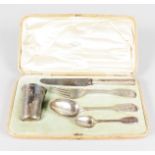 A FOUR PIECE RUSSIAN CHRISTENING SET by SHANKS & BOLIN, MOSCOW 1885, in original leather fitted