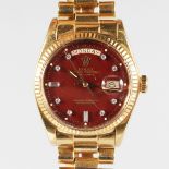 A SUPERB GENTLEMAN'S 18CT YELLOW GOLD ROLEX DAY-DATE CHRONOMETER with red face set with diamonds, in
