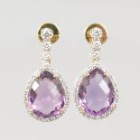 A PAIR OF AMETHYST AND DIAMOND PEAR SHAPED DROP EARRINGS, OVER 5CTS, set in 18ct yellow gold.