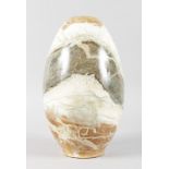 A POLISHED MINERAL VASE. 13.5ins high.