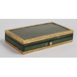 A GOOD REGENCY RECTANGULAR BOX, the lid with an inside mirror, the box with brass banding. 4.5ins