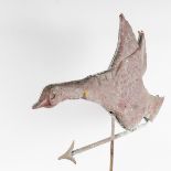 A RARE 19TH CENTURY AMERICAN FOLK ART COPPER FLYING DUCK WEATHER VANE. 27ins long.