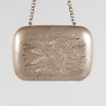 AN ENGRAVED RUSSIAN PURSE on a chain. 7cms long, stamped 84.