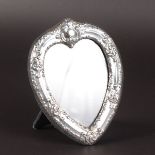 A HEART SHAPED PHOTOGRAPH FRAME. 7ins x 5.5ins.