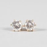 A PAIR OF 9CT YELLOW GOLD STUD EARRINGS.