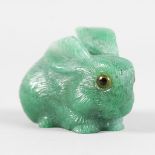 A CARVED RUSSIAN HARDSTONE RABBIT. 5cms long.