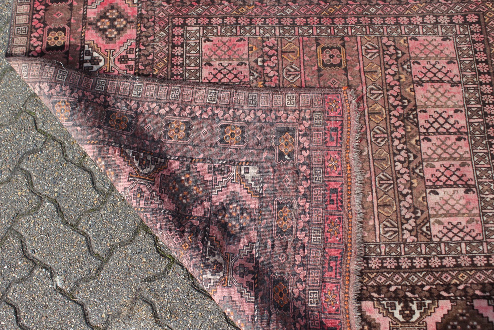 A PERSIAN CARPET, red ground with double central pattern, floral border. 7ft 6ins x 5ft 6ins. - Image 4 of 4