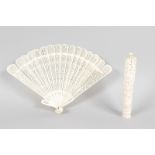 A PIERCED IVORY FAN AND BOBBIN CASE (2).