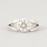 AN 18CT WHITE GOLD DIAMOND SET HALO STYLE RING, 1.5CTS.