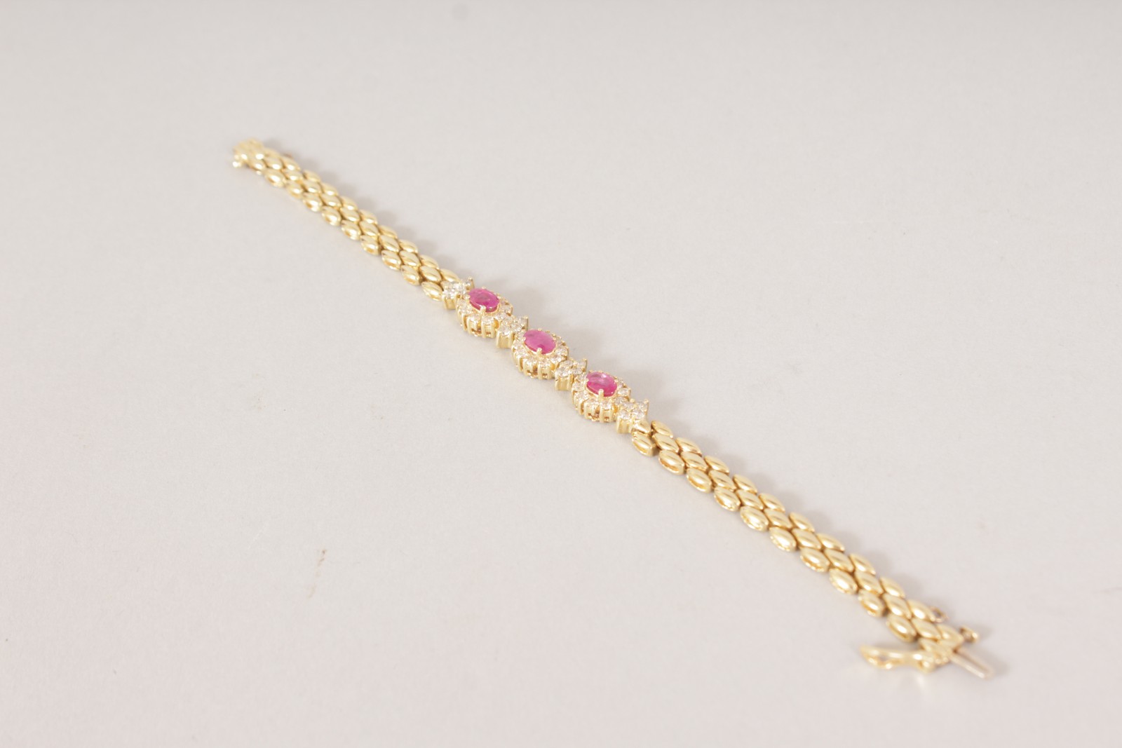 AN 18CT YELLOW GOLD, RUBY AND DIAMOND BRACELET. - Image 2 of 4