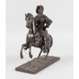 19TH CENTURY FRENCH A GOOD BRONZE OF A CAVALIER ON HORSEBACK, the horse rearing up on its back legs.