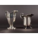 TWO SILVER CREAM JUGS. Sheffield 1938 and 1907.